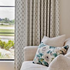 Gray Graphic Curtain and Floral Pillow