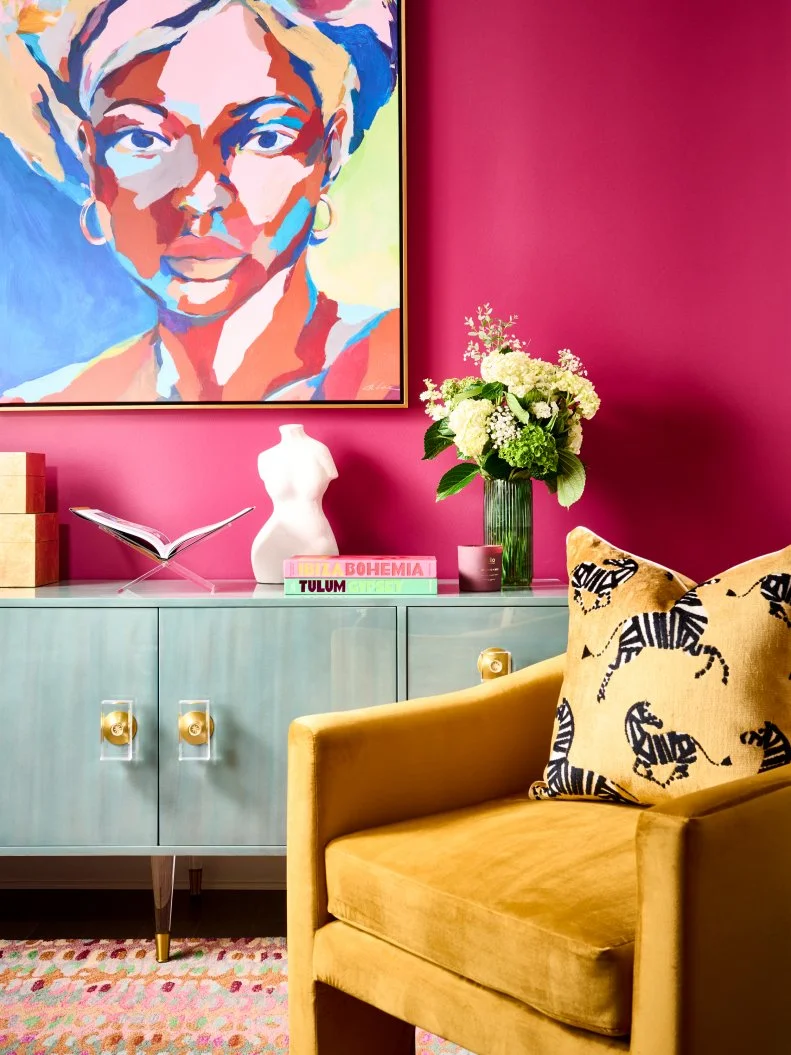 Magenta Sitting Area With Green Credenza and Yellow Chair