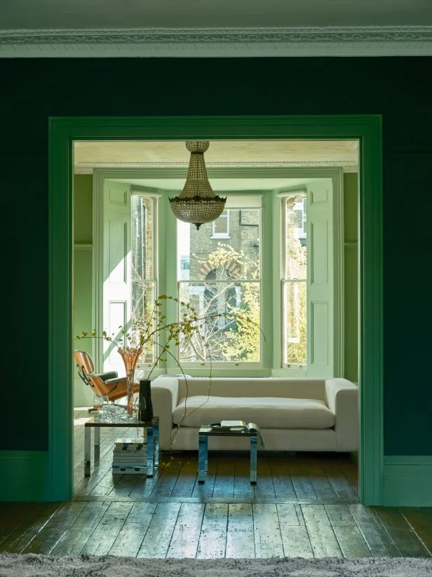 Dark and Light Green Painted Nook With a Sitting Area