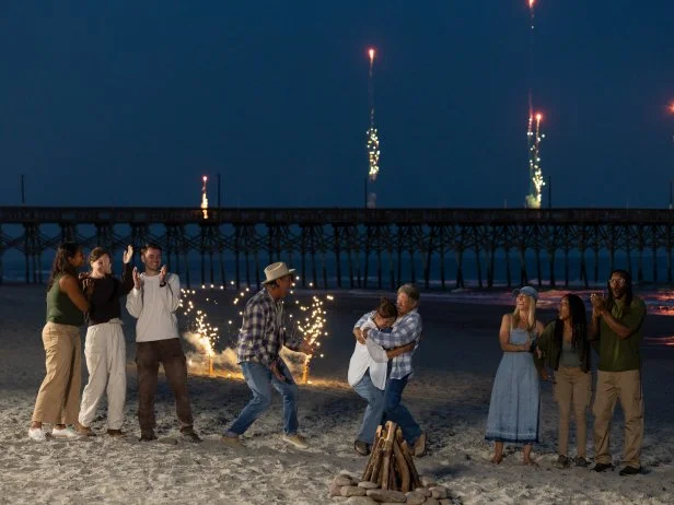Teams and mentors react and celebrate as Ty Pennington’s team of Sydney Lorence and Michelle Mueller are announced as the overall winner, as seen on Battle on the Beach, Season 5.