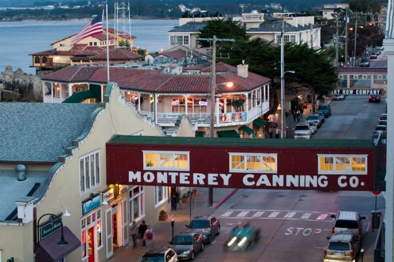 A sign for Monterey Canning Co. on the waterfront at Cannery Row