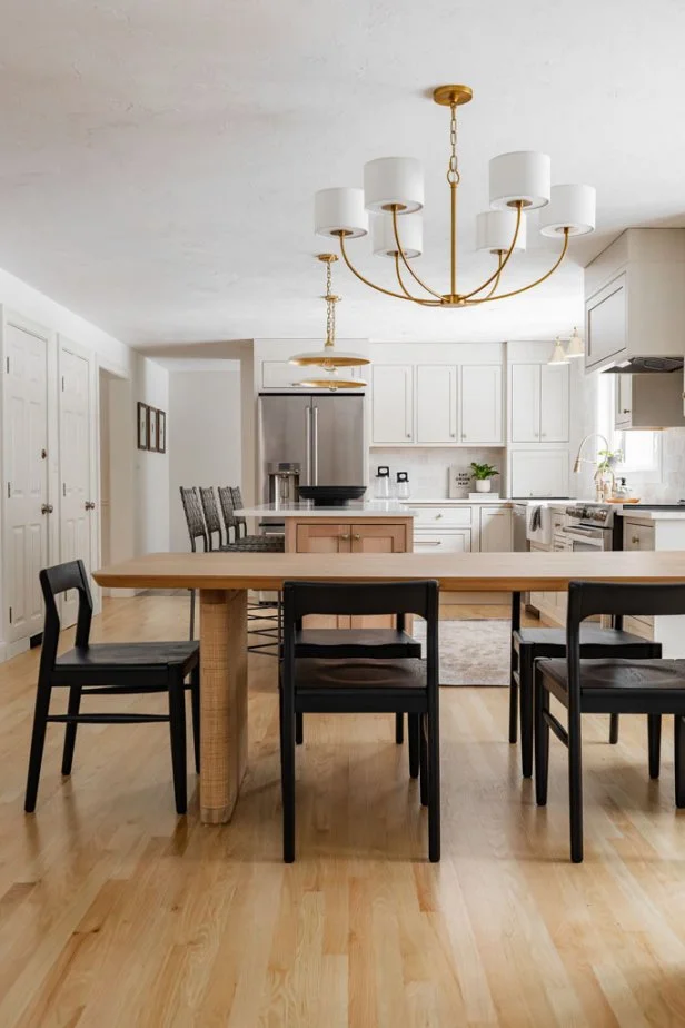 White Eat In Kitchen With Black Chairs
