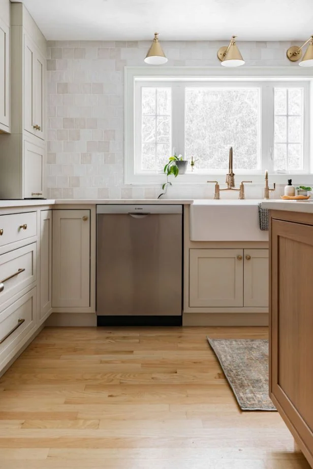 White Chef Kitchen With Brass Sconces
