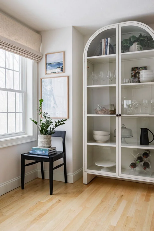 Arched Cabinet and Black Chair