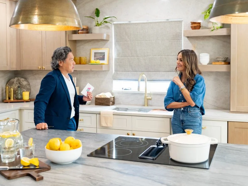 Mentor Sabrina Soto and Judge Vern Yip in the kitchen, as seen on Totally 90’s House, Season 1.