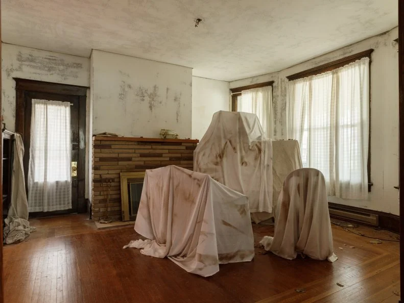 Before of the Bihl Manor parlor, as seen on A Very Haunted Renovation, Season 1.