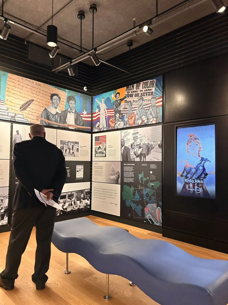 A man looking at exhibits in the Thaddeus Stevens and Lydia Hamilton Smith Center for History and Democracy
