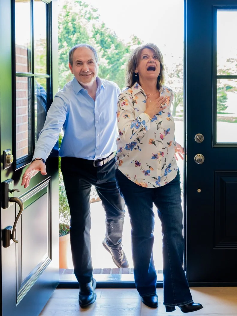 Homeowners Nikos and Anna Yiantsos react to the reveal of their newly renovated home, as seen on Totally 90ís House, Season 1.