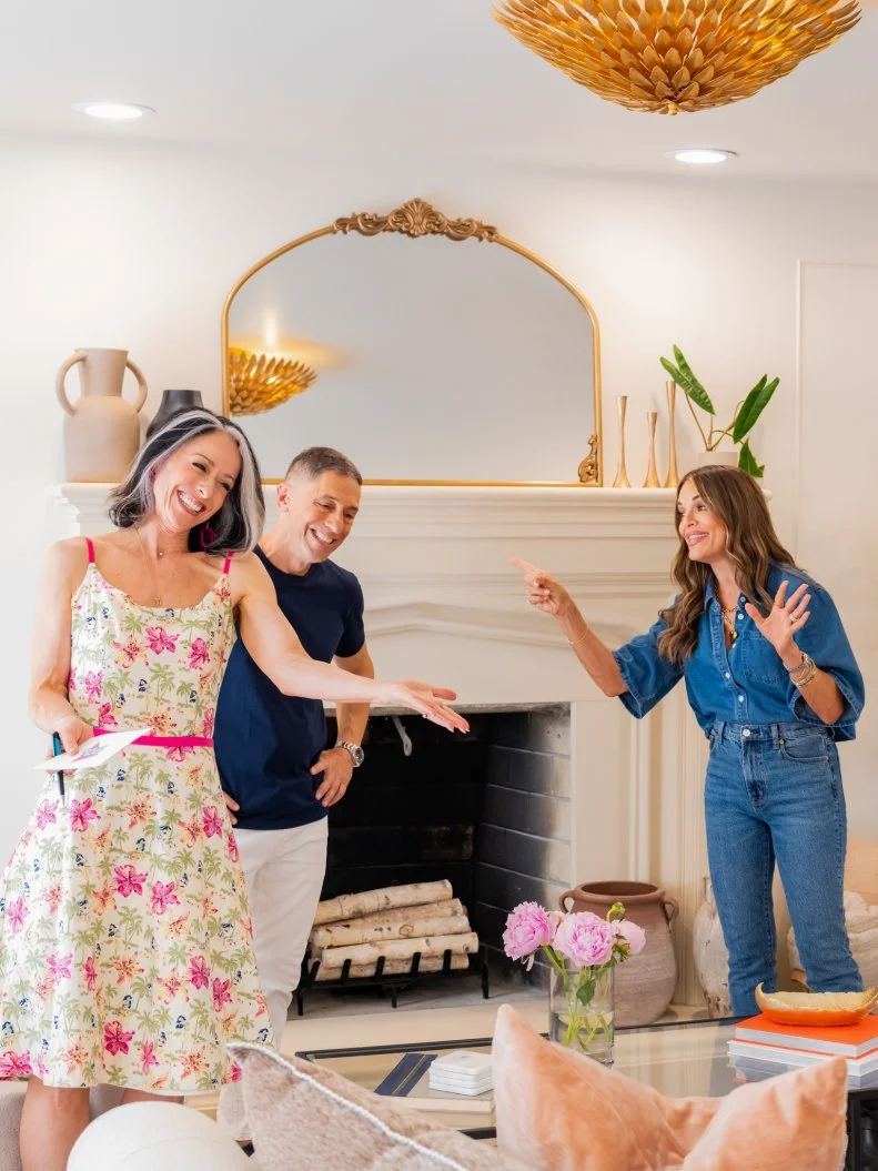 Mentor Sabrina Soto with Judges Jonathan Adler and Paige Davis in the formal living room, as seen on Totally 90’s House, Season 1.