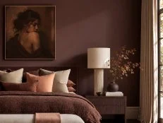 Cozy Brown Bedroom With Vintage-Inspired Art