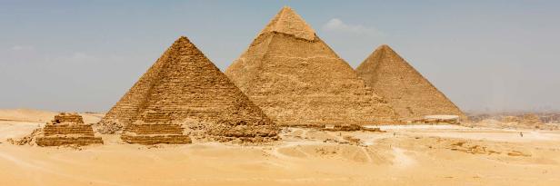 The Pyramids plateau is dominated by the massive pyramids of Khufu (Cheops), Khafre (Chephren), and Menkaure (Mycerinus).
