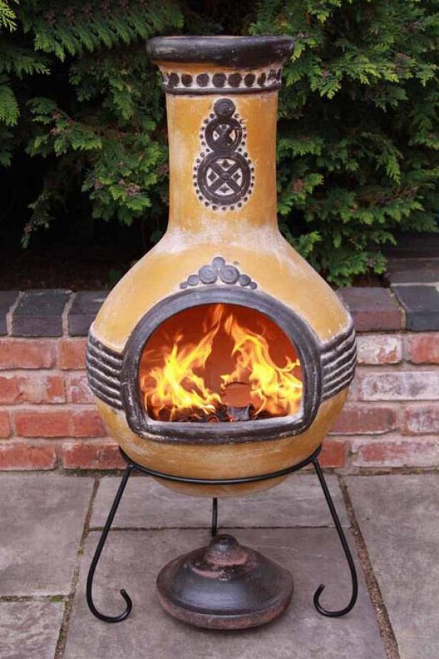 10 Best Chiminea Fire Pits For Your Backyard Clay Steel And More Hgtv