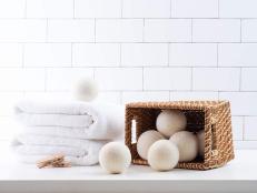 Reusable wool dryer balls help rid your laundry of those annoying disposable dryer sheets and dry your clothes faster.