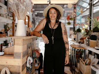 LaToya Tucciarone stands in her shop, SustainAble Home Goods, located at Ponce City Market in Atlanta.