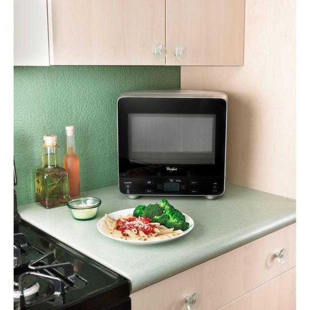https://hgtvhome.sndimg.com/content/dam/images/hgtv/products/2020/8/10/rx_thehomedepot_whirlpool-05-cu-ft-countertop-microwave.jpeg.rend.hgtvcom.616.616.suffix/1597118005828.jpeg