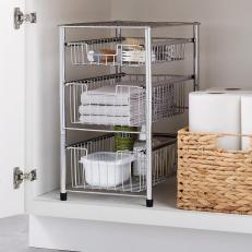 https://hgtvhome.sndimg.com/content/dam/images/hgtv/products/2021/1/21/5/rx_thecontainerstore_wire-pull-out-cabinet-organizers.rend.hgtvcom.231.231.suffix/1611269756586.jpeg