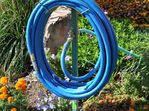10 Best Garden Hose Storage Solutions for Your Yard + Patio