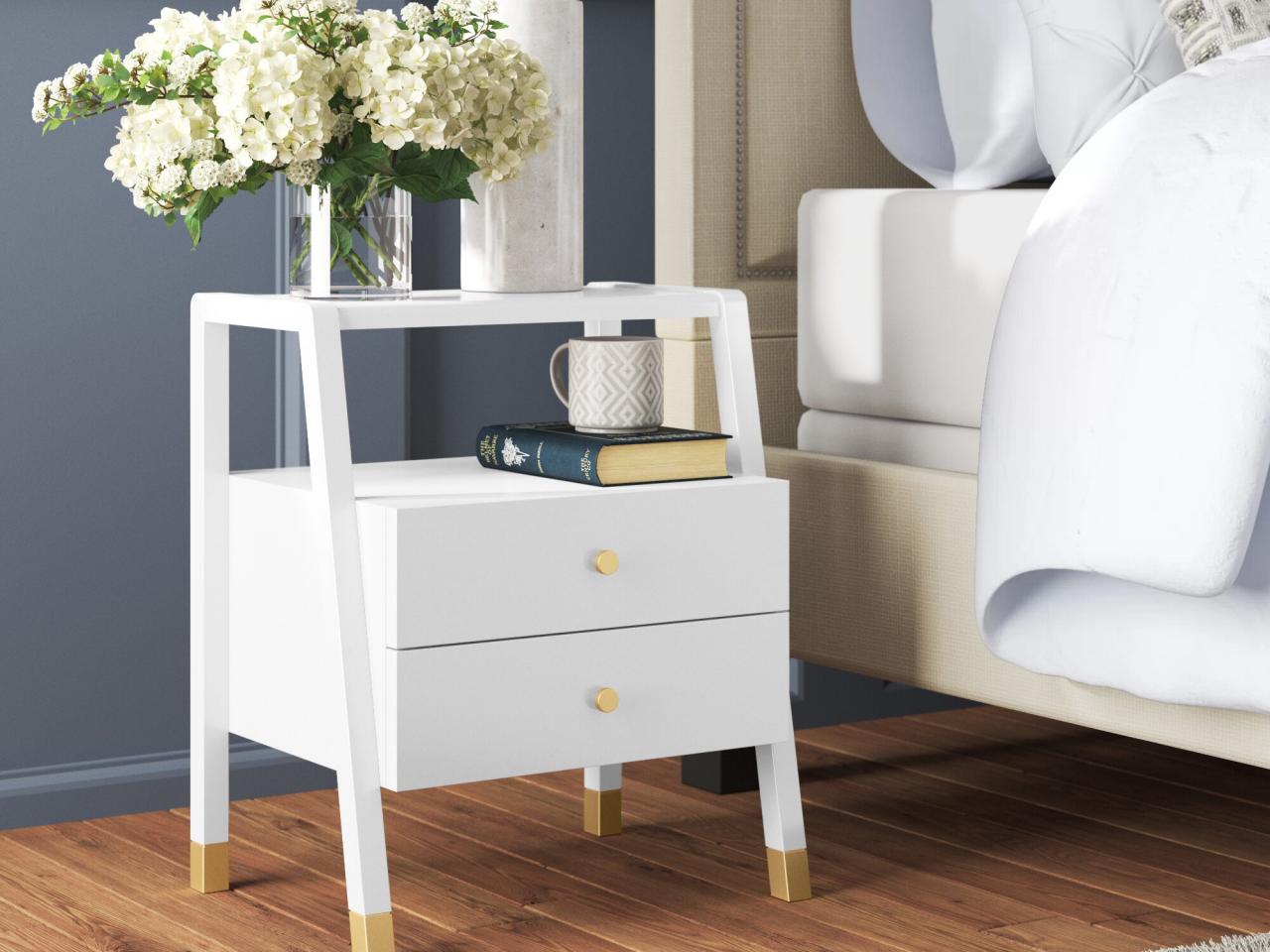 https://hgtvhome.sndimg.com/content/dam/images/hgtv/products/2022/1/21/rx_wayfair_swaney-solid-wood-side-table.jpeg.rend.hgtvcom.1280.960.suffix/1642801284025.jpeg