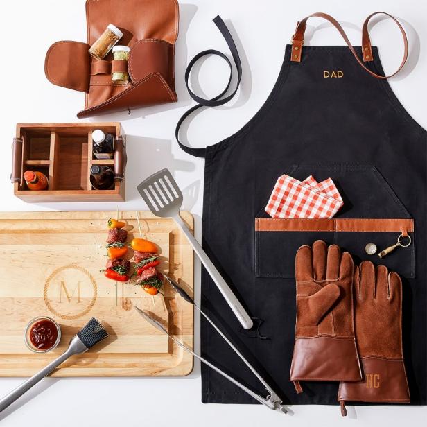 https://hgtvhome.sndimg.com/content/dam/images/hgtv/products/2022/10/18/1/rx_mark-and-graham_waxed-canvas-and-leather-bbq-apron.jpeg.rend.hgtvcom.616.616.suffix/1666103021328.jpeg