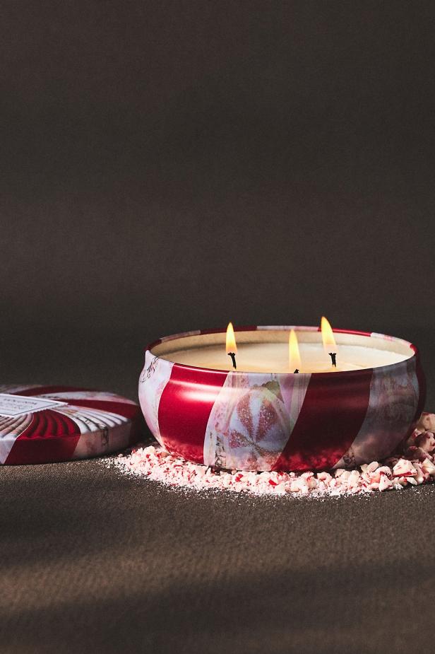 https://hgtvhome.sndimg.com/content/dam/images/hgtv/products/2022/10/24/4/rx_anthropologie_voluspa-candy-cane-tin-candle.jpeg.rend.hgtvcom.616.924.suffix/1666627609230.jpeg