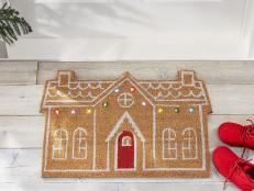 Dress your doorstep for the holiday season with one of these festive, welcoming doormats.