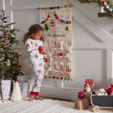 https://hgtvhome.sndimg.com/content/dam/images/hgtv/products/2023/10/1/rx-pottery-barn-kids_merry--bright-advent-calendar.jpeg.rend.hgtvcom.231.231.suffix/1696201083472.jpeg