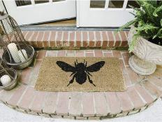 Celebrate warmer temps with these adorable outdoor mats.