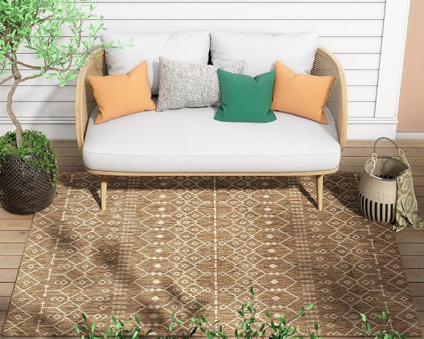 https://hgtvhome.sndimg.com/content/dam/images/hgtv/products/2023/3/17/rx_amazon_well-woven-nors-brown-indoor-outdoor-flat-weave-pile-nordic-lattice-area-rug.jpeg.rend.hgtvcom.616.493.suffix/1679076782902.jpeg