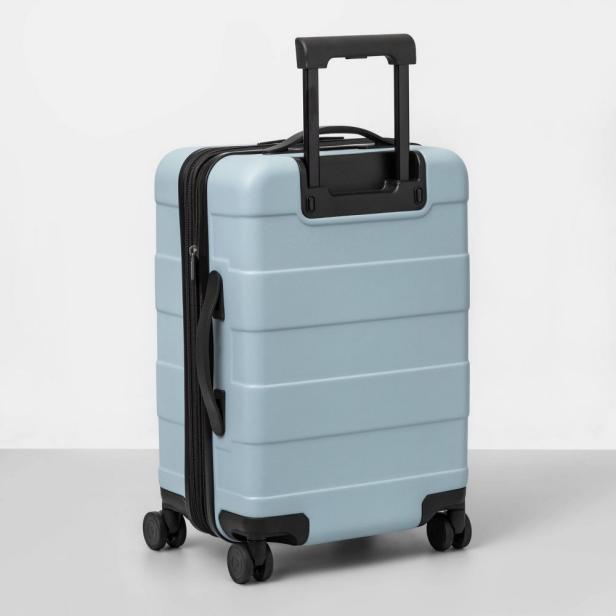 https://hgtvhome.sndimg.com/content/dam/images/hgtv/products/2023/6/27/rx_target_hardside-carry-on-spinner-suitcase.jpeg.rend.hgtvcom.616.616.suffix/1687919953321.jpeg