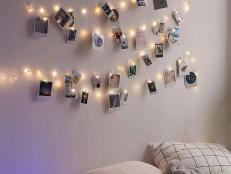 Perk up those stark white walls with these charming corkboards, photo grids, string light garlands and more.