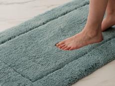 We stood and spilled on 20 bath mats to find the softest, most absorbent and slip-resistant options that keep your toes dry and elevate your space.