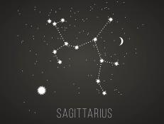 Astrology sign Sagittarius on chalkboard background. Zodiac constellation and part of zodiacal system and ancient calendar. Mystic symbol with stars, sun, moon and dots. Western horoscope illustration