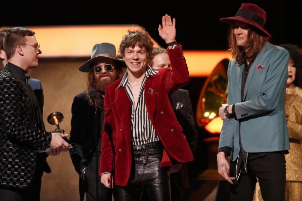 LOS ANGELES, CA - FEBRUARY 12:  (L-R) Musicians Brad Shultz, Matthan Minster, Matt Schultz and Nick Bockrath of Cage the Elephant accept the Best Rock Album award for 'Tell Me I'm Prett ' onstage at the Premiere Ceremony during the 59th GRAMMY Awards at Microsoft Theater on February 12, 2017 in Los Angeles, California.  (Photo by Rich Polk/WireImage)