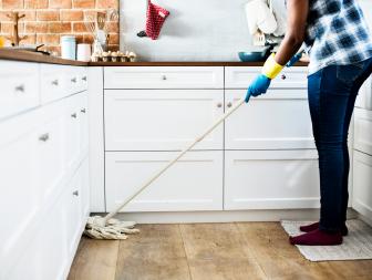 Black woman doing house chores