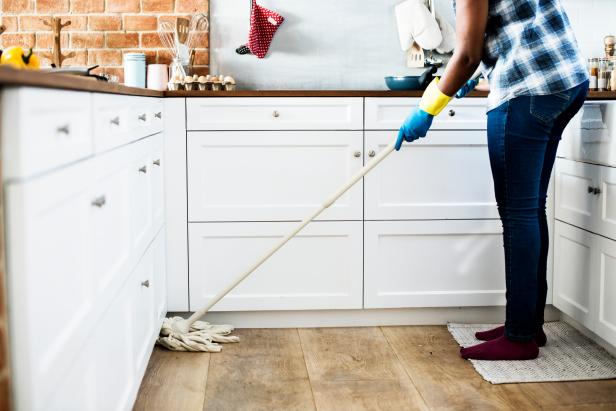 Black woman doing house chores