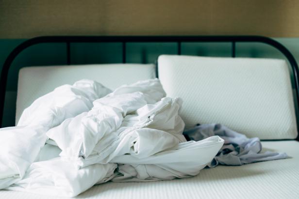how to clean a mattress: clean bedding with hot water