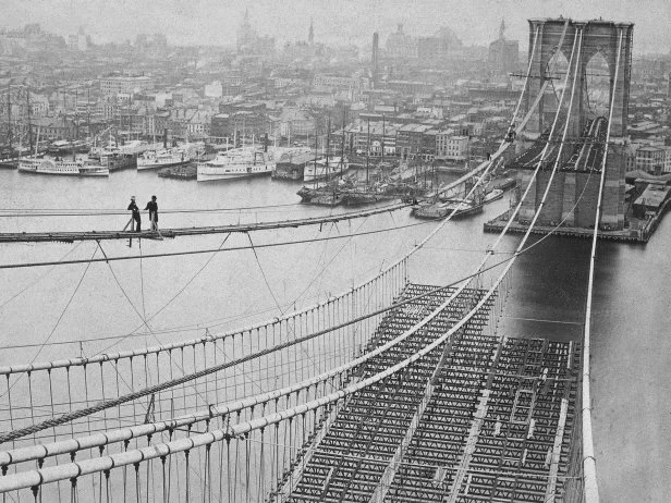 Photograph of the Brooklyn Bridge whilst under construction, dated 1883.