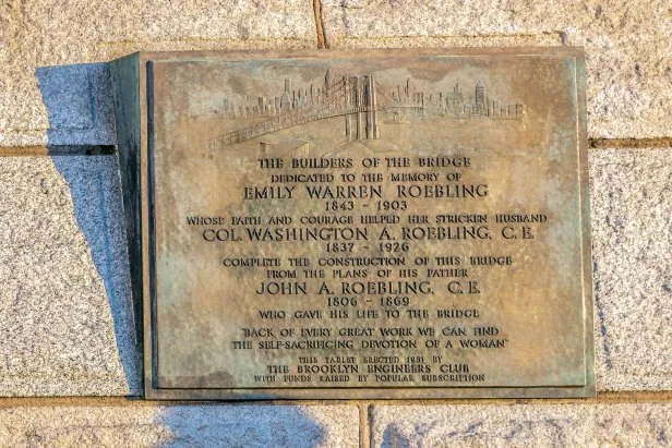 Descriptive plaque on the Brooklyn Bridge, dedicated to the memory of Emily Warren Roebling who helped her husband to complete construction of the suspension bridge.