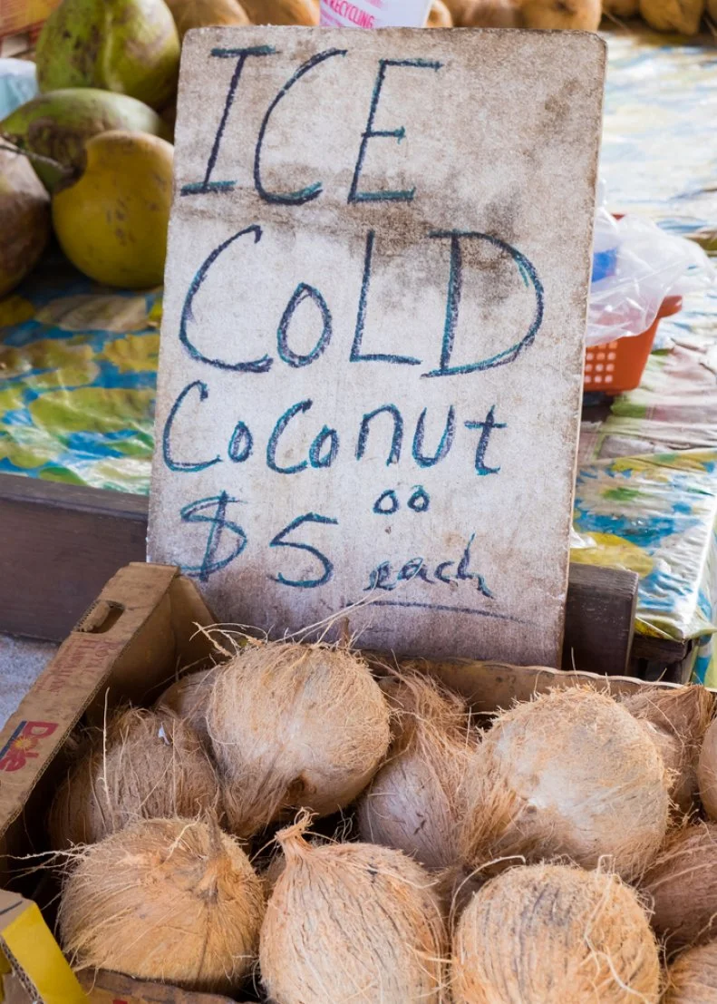 Farmer's market on the North Shore of Oahu Hawaii with ice cold coconuts for sale.