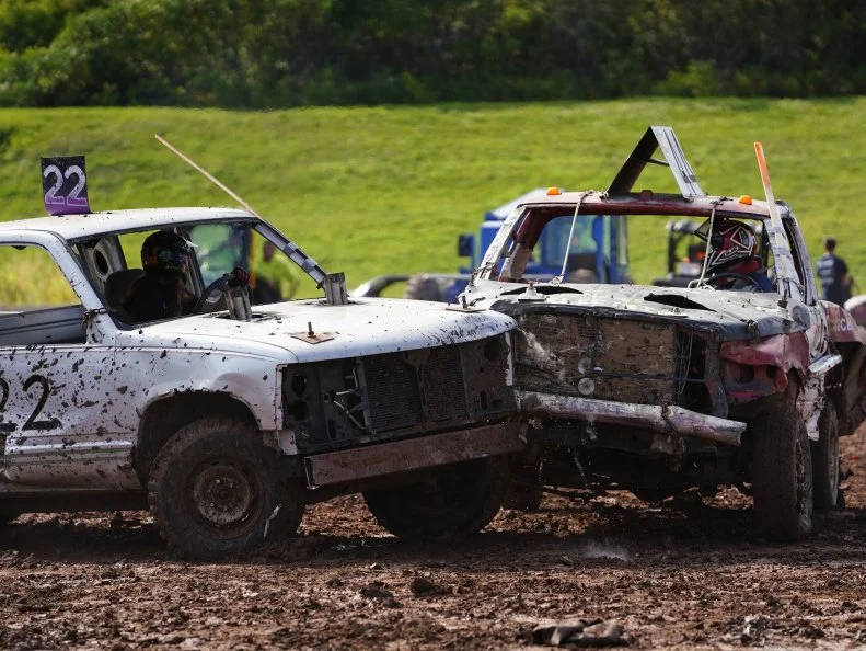 Fond du Lac, Wisconsin / USA - July 21st, 2019: Many Wreck broken down vehicles smash and run into each other in a derby.