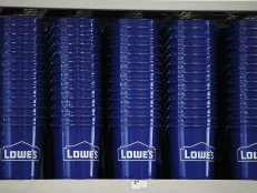 Stacks of buckets sit on display for sale inside a Lowe's Cos. store in Burbank, California, U.S., on Friday, May 19, 2017. Lowe's Cos. is scheduled to release earnings figures on May 24. Photographer: Patrick T. Fallon/Bloomberg via Getty Images
