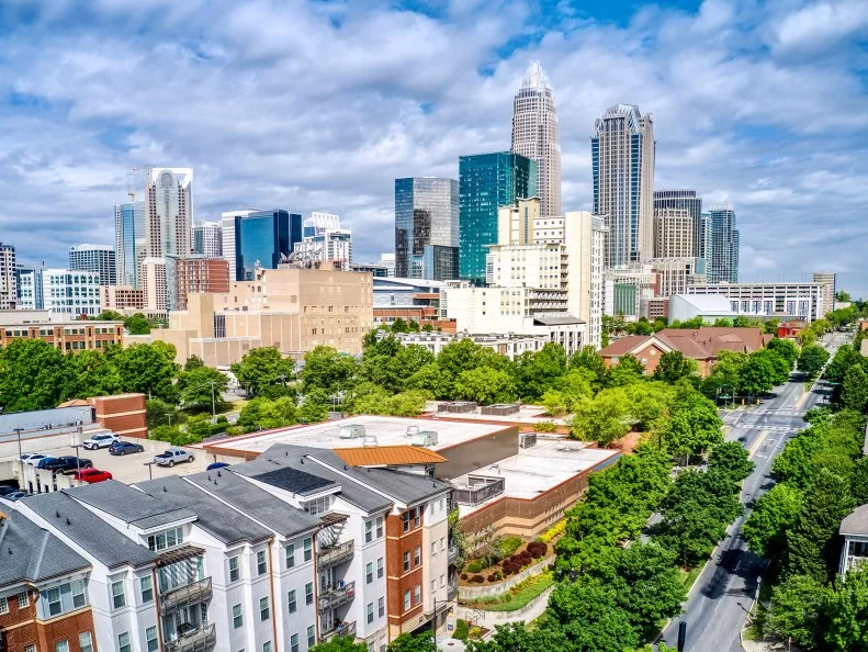 Aerial drone image of downtown Charlotte North Carolina from the First Ward on a sunny day.