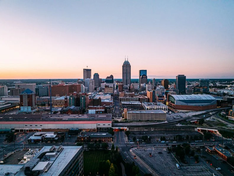 High-Angle view of Indianapolis, Indiana, Marion County Skyline at Sunset at night in Summertime.

Salesforce Tower, OneAmerica Tower, Regions Tower, Market Tower, PNC Center are prominent buildings in the Indy Skyline.