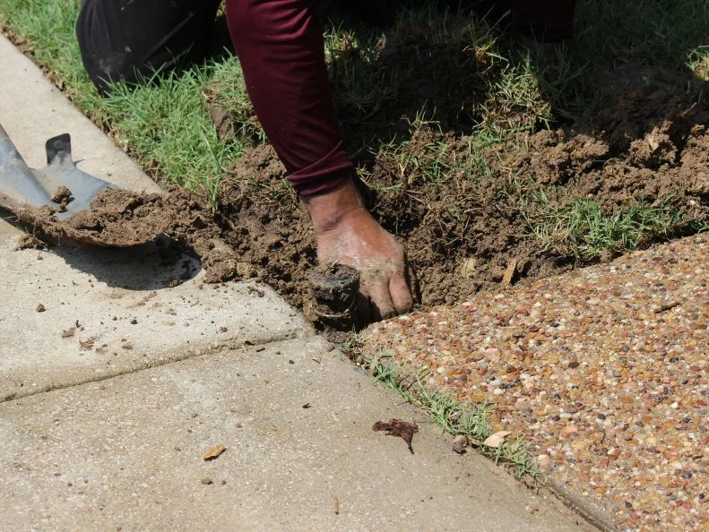 Replacing a broken lawn sprinkler head