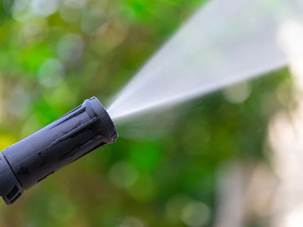 Close-up sprinkler nozzle spraying