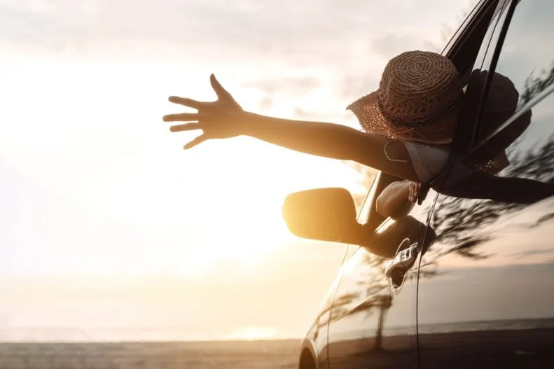 Hatchback Car travel driving road trip of woman summer vacation in car at sunset,Girls happy traveling enjoy holidays and relaxation with friends together get the atmosphere and go to destination