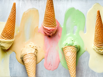 Colorful ice cream cones of different flavors. Melting scoops. Top view, steel metal background