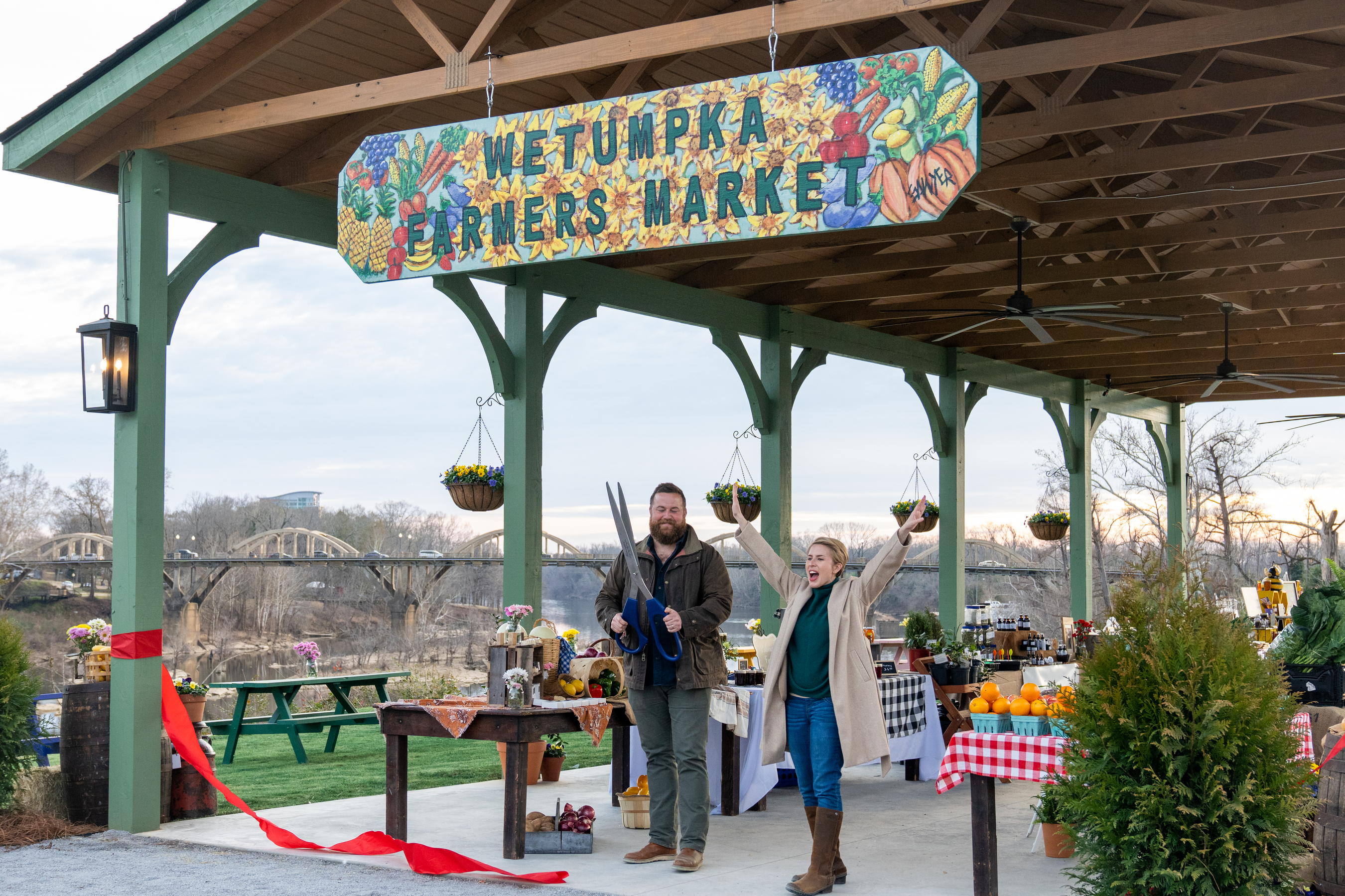 As seen on Home Town Takeover, Ben and Erin Napier at the Wetumpka Farmers Market grand opening and celebration.