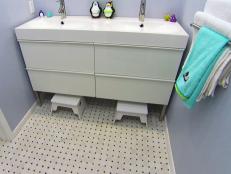 A new vanity and flooring completes this bathroom renovation