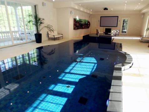Million Dollar Rooms Home Theater with Swimming Pool